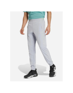 Pantalon jogging tech app gris et vert homme - Adidas
